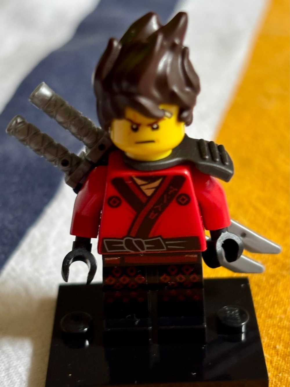 The LEGO NINJAGO MOVIE "Kai" njo0360 with stand & accessories.